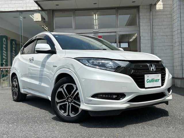 ホンダ ヴェゼル ハイブリッド Z ホンダセンシング 埼玉県 2017(平29)年 4.8万km ホワイトオーキッドパール 純正8インチナビ/【CD/DVD/フルセグ/Bluetooth】/衝突軽減ブレーキ/レーダークルーズコントロール/バックカメラ/ETC/シートヒーター/横滑り防止装置/アイドリングストップ/ハーフレザーシート/スペアキー