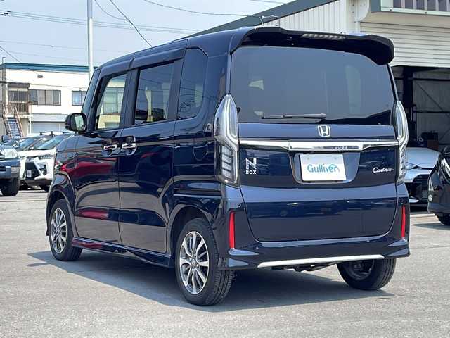 ホンダ Ｎ ＢＯＸ カスタム L 道北・旭川 2022(令4)年 2.1万km ミッドナイトブルービームM ・４WD/・禁煙車/・ワンオーナー/・純正ホイール冬タイヤ積込み/・社外ナビ/CD/DVD/BT/SD/USB/AUX/iPod/フルセグTV/・前席シートヒーター/・片側電動スライドドア/・後方コーナーセンサー/・バックカメラ/・純正エンジンスターター/・ホンダセンシング/・急アクセル抑制機能/・近距離衝突軽減ブレーキ/・先行車発進お知らせ機能/・歩行者事故低減ステアリング/・路外逸脱抑制機能/・渋滞追従機能付アダプティブクルーズコントロール/・前方ドライブレコーダー/・リアサンシェード/・純正フロアマット/・LEDヘッドライト/・オートライト/・ドアバイザー/・保証書＆取扱説明書/・スペアキー