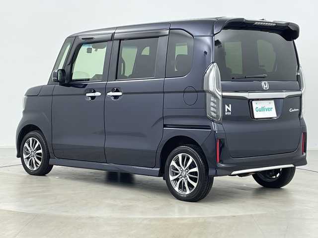 ホンダ Ｎ ＢＯＸ カスタム L 道央・札幌 2022(令4)年 2.1万km ミッドナイトブルービームM ・4WD/・純正ナビ&CD&DVD&SD&BT&TV/・バックカメラ/・左側パワースライドドア/・Honda　SENSING/・前席シートヒーター/・ドアミラーヒーター/・純正前方ドライブレコーダー/・コーナーセンサー/・LEDヘッドライト/・オートライト/・オートハイビーム/・スマートキー/・純正14インチAW/・スタッドレスタイヤ積込