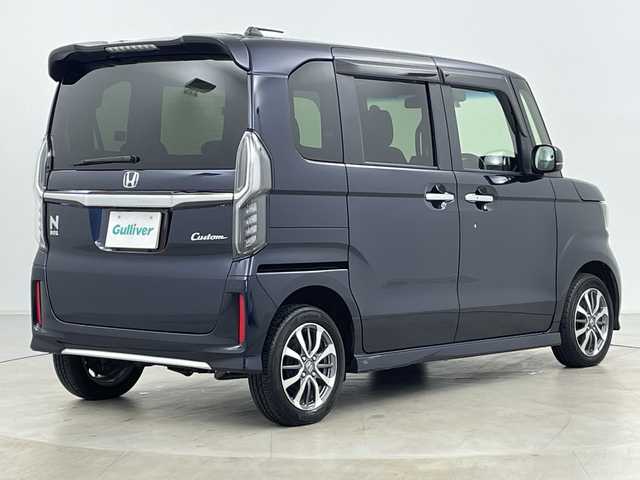 ホンダ Ｎ ＢＯＸ カスタム L 道央・札幌 2022(令4)年 2.1万km ミッドナイトブルービームM ・4WD/・純正ナビ&CD&DVD&SD&BT&TV/・バックカメラ/・左側パワースライドドア/・Honda　SENSING/・前席シートヒーター/・ドアミラーヒーター/・純正前方ドライブレコーダー/・コーナーセンサー/・LEDヘッドライト/・オートライト/・オートハイビーム/・スマートキー/・純正14インチAW/・スタッドレスタイヤ積込