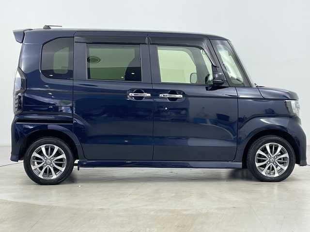ホンダ Ｎ ＢＯＸ カスタム L 道央・札幌 2022(令4)年 2.1万km ミッドナイトブルービームM ・4WD/・純正ナビ&CD&DVD&SD&BT&TV/・バックカメラ/・左側パワースライドドア/・Honda　SENSING/・前席シートヒーター/・ドアミラーヒーター/・純正前方ドライブレコーダー/・コーナーセンサー/・LEDヘッドライト/・オートライト/・オートハイビーム/・スマートキー/・純正14インチAW/・スタッドレスタイヤ積込