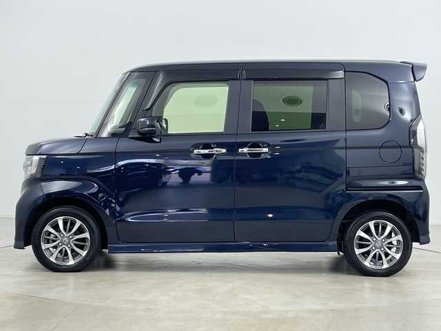 ホンダ Ｎ ＢＯＸ カスタム L 道央・札幌 2022(令4)年 2.1万km ミッドナイトブルービームM ・4WD/・純正ナビ&CD&DVD&SD&BT&TV/・バックカメラ/・左側パワースライドドア/・Honda　SENSING/・前席シートヒーター/・ドアミラーヒーター/・純正前方ドライブレコーダー/・コーナーセンサー/・LEDヘッドライト/・オートライト/・オートハイビーム/・スマートキー/・純正14インチAW/・スタッドレスタイヤ積込