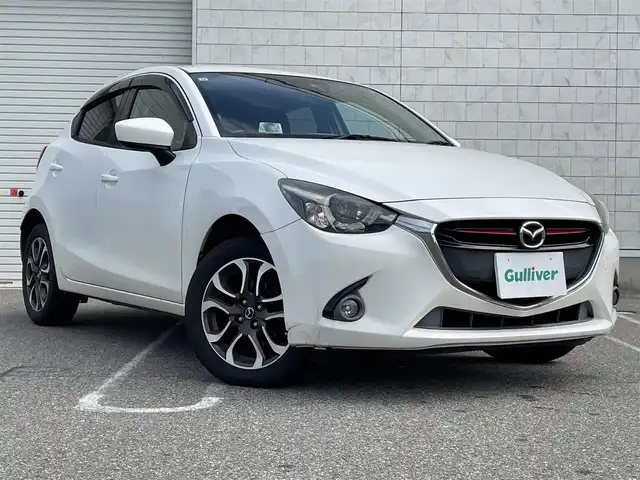 マツダ デミオ XD ツーリング 新潟県 2015(平27)年 12.7万km スノーフレイクホワイトパールマイカ 4WD/衝突軽減/純正ナビ/(AM/FM/CD/DVD/BT/フルセグ)/ETC/クルーズコントロール/アイドリングストップ/HUD/BSM/革巻きステアリング/ステアリングスイッチ/パドルシフト/MTモード付きAT/AUTOライト/LEDヘッドライト/フォグランプ/プッシュスタート/スマートキー