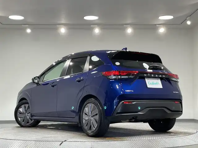 日産 ノート X 愛知県 2021(令3)年 2.2万km オーロラフレアブルーパール 純正９インチナビ　/（FM/AM/Bluetooth/USB/HDMI/AppleCarPlay/AndroidAuto/フルセグTV)/アラウンドビューモニター　/衝突軽減ブレーキ　/プロパイロット　/ブラインドスポットモニター　/ワイヤレス充電　/デジタルインナーミラー　/ビルトインＥＴＣ２．０　/ＳＯＳコール　/踏み間違い衝突防止/車線逸脱警報/標識検知機能/クリアランスソナー/ドライブレコーダー　/USB入力端子/オートライト/純正フロアマット/電動パーキングブレーキ