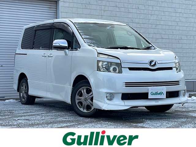トヨタ ヴォクシー ZS 道央・札幌 2008(平20)年 18.6万km ホワイトパールクリスタルシャイン ・４WD/・寒冷地仕様/・純正HDDナビ/フルセグTV／ラジオ／ＣＤ／ＤＶＤ/・純正フリップダウンモニター/・バックカメラ/・片側パワースライドドア/・ＷＡＣ/・パドルシフト/・ドライブレコーダー/・社外エンジンスターター/・ビルトインＥＴＣ/・フォグランプ/・スペアキー/・社外15インチAW/・ウィンカーミラー/・純正フロアマット/・取扱説明書