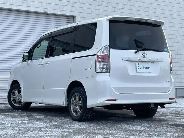 トヨタ ヴォクシー ZS 道央・札幌 2008(平20)年 18.6万km ホワイトパールクリスタルシャイン ・４WD/・寒冷地仕様/・純正HDDナビ/フルセグTV／ラジオ／ＣＤ／ＤＶＤ/・純正フリップダウンモニター/・バックカメラ/・片側パワースライドドア/・ＷＡＣ/・パドルシフト/・ドライブレコーダー/・社外エンジンスターター/・ビルトインＥＴＣ/・フォグランプ/・スペアキー/・社外15インチAW/・ウィンカーミラー/・純正フロアマット/・取扱説明書