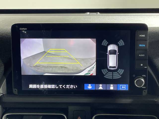 ホンダ フリード ハイブリット e:HEV AIR EX 神奈川県 2025(令7)年 0.1千km ソニックグレーパール 登録済未使用車/純正9型ディスプレイオーディオ【LXM-242ZFNI】/ホンダコネクトナビ/フルセグ　Bluetooth　AM FM　USB　iPod　/両側電動スライドドア【サンシェード】/ホンダセンシング/CMBS衝突軽減ブレーキ/誤発進抑制機能/急アクセル抑制機能/路外逸脱抑制機能/アダブティブクルーズコントロール/LKAS車線維持支援システム/先行車発進お知らせ機能/標識認識機能/ブラインドスポットインフォメーション/パーキングセンサーシステム/後退出庫サポート/オートハイビーム/革巻きステアリング/前席シートヒーター/ECON/電動パーキングブレーキ/オートブレーキホールド/プッシュスタート/スマートキー/純正15インチアルミホイール/LEDヘッドランプ/オートライト/スペアキー