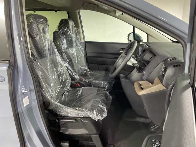 ホンダ フリード ハイブリット e:HEV AIR EX 神奈川県 2025(令7)年 0.1千km ソニックグレーパール 登録済未使用車/純正9型ディスプレイオーディオ【LXM-242ZFNI】/ホンダコネクトナビ/フルセグ　Bluetooth　AM FM　USB　iPod　/両側電動スライドドア【サンシェード】/ホンダセンシング/CMBS衝突軽減ブレーキ/誤発進抑制機能/急アクセル抑制機能/路外逸脱抑制機能/アダブティブクルーズコントロール/LKAS車線維持支援システム/先行車発進お知らせ機能/標識認識機能/ブラインドスポットインフォメーション/パーキングセンサーシステム/後退出庫サポート/オートハイビーム/革巻きステアリング/前席シートヒーター/ECON/電動パーキングブレーキ/オートブレーキホールド/プッシュスタート/スマートキー/純正15インチアルミホイール/LEDヘッドランプ/オートライト/スペアキー