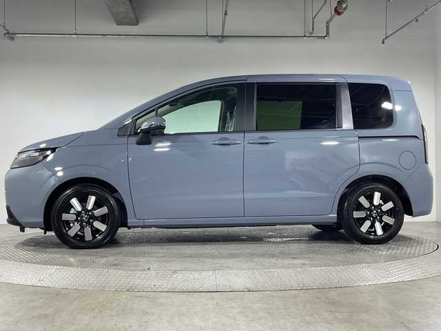 ホンダ フリード ハイブリット e:HEV AIR EX 神奈川県 2025(令7)年 0.1千km ソニックグレーパール 登録済未使用車/純正9型ディスプレイオーディオ【LXM-242ZFNI】/ホンダコネクトナビ/フルセグ　Bluetooth　AM FM　USB　iPod　/両側電動スライドドア【サンシェード】/ホンダセンシング/CMBS衝突軽減ブレーキ/誤発進抑制機能/急アクセル抑制機能/路外逸脱抑制機能/アダブティブクルーズコントロール/LKAS車線維持支援システム/先行車発進お知らせ機能/標識認識機能/ブラインドスポットインフォメーション/パーキングセンサーシステム/後退出庫サポート/オートハイビーム/革巻きステアリング/前席シートヒーター/ECON/電動パーキングブレーキ/オートブレーキホールド/プッシュスタート/スマートキー/純正15インチアルミホイール/LEDヘッドランプ/オートライト/スペアキー