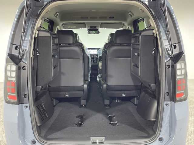 ホンダ フリード ハイブリット e:HEV AIR EX 神奈川県 2025(令7)年 0.1千km ソニックグレーパール 登録済未使用車/純正9型ディスプレイオーディオ【LXM-242ZFNI】/ホンダコネクトナビ/フルセグ　Bluetooth　AM FM　USB　iPod　/両側電動スライドドア【サンシェード】/ホンダセンシング/CMBS衝突軽減ブレーキ/誤発進抑制機能/急アクセル抑制機能/路外逸脱抑制機能/アダブティブクルーズコントロール/LKAS車線維持支援システム/先行車発進お知らせ機能/標識認識機能/ブラインドスポットインフォメーション/パーキングセンサーシステム/後退出庫サポート/オートハイビーム/革巻きステアリング/前席シートヒーター/ECON/電動パーキングブレーキ/オートブレーキホールド/プッシュスタート/スマートキー/純正15インチアルミホイール/LEDヘッドランプ/オートライト/スペアキー