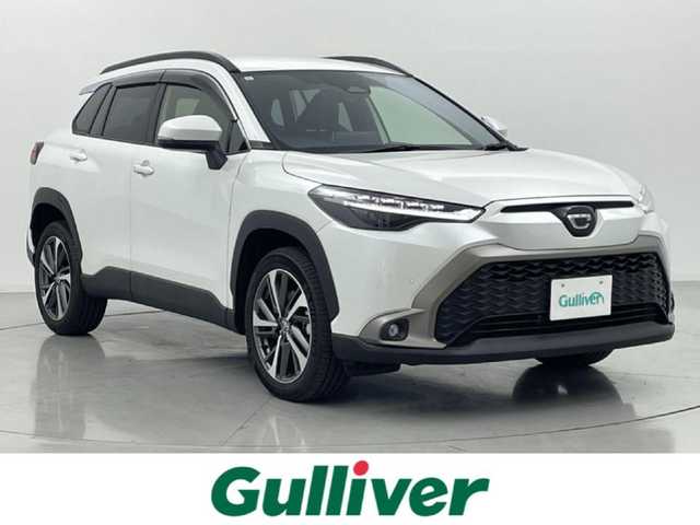 トヨタ カローラ クロス ハイブリッド Z 熊本県 2024(令6)年 1.5万km プラチナホワイトパールマイカ 純正ナビ（ＡＭ・ＦＭ・フルセグ・ＢＴ・HDMI）/バックカメラ　/ビルトインＥＴＣ２．０　/純正前後ドライブレコーダー　/前後クリアランスソナー　/レーダークルーズコントロール　/前席シートヒーター　/運転席パワーシート/パワーバックドア/ルーフレール/ハーフレザーシート/純正フロアマット/純正１８インチAW/オートライト/オートマチックハイビーム/LEDヘッドライト/フォグランプ/スマートキー/プッシュスタート/取扱説明書