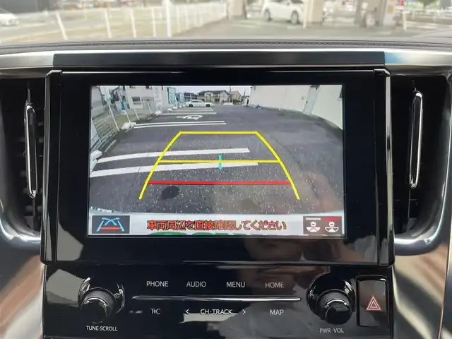 トヨタ アルファード S タイプゴールド 三重県 2021(令3)年 1.7万km ホワイトパールクリスタルシャイン 登録時16881km/三眼ヘッドライト/ハーフレザーシート/純正ナビ/（AM/FM/TV/Bluetooth/DVD/Miracast）/フルセグTV/バックカメラ/純正フリップダウンモニター/ビルトインETC/ステアリングスイッチ/レーダークルーズコントロール/オートライト/オートハイビーム/パワーバックドア/両側パワースライドドア/後席オットマン/社外レーダー/トヨタセーフティセンス/プリクラッシュセーフティ/レーンディパーチャーアシスト/クリアランスソナー/プッシュスタート/純正18インチアルミ/スペアキー/社外フロアマット