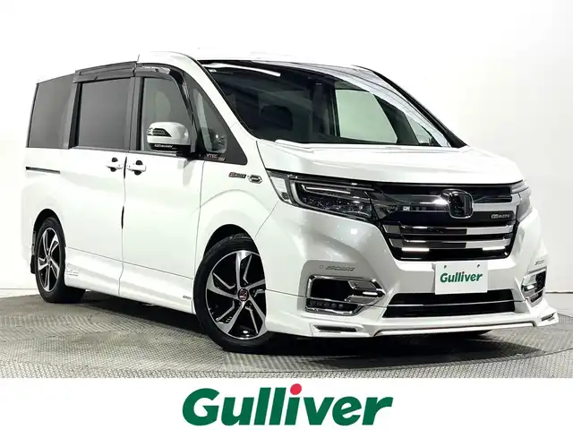 ホンダ ステップワゴン スパーダ ホンダセンシング 大阪府 2018(平30)年 2.5万km プラチナホワイトパール 無限エアロ　純正１０ｉｎｃナビ（フルセグ／ＤＶＤ再生／Ｂｌｕｅｔｏｏｔｈ）　バックカメラ　後席モニター　ＥＴＣ　両側パワースライドドア　衝突軽減　レーダークルコン　リフトアップシート　クリアランスソナー　レーンアシスト