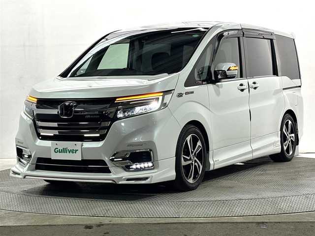ホンダ ステップワゴン スパーダ ホンダセンシング 大阪府 2018(平30)年 2.5万km プラチナホワイトパール 無限エアロ　純正１０ｉｎｃナビ（フルセグ／ＤＶＤ再生／Ｂｌｕｅｔｏｏｔｈ）　バックカメラ　後席モニター　ＥＴＣ　両側パワースライドドア　衝突軽減　レーダークルコン　リフトアップシート　クリアランスソナー　レーンアシスト