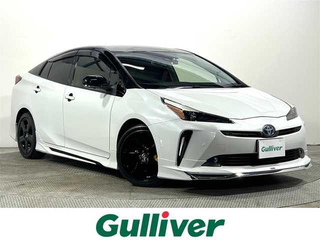 トヨタ プリウス A ツーリングセレ ブラックED 大阪府 2021(令3)年 3.3万km 白Ⅱ モデリスタエアロ　黒革シート　純正ナビＴＶ　３６０カメラ　パワーシート／ヒーター　衝突軽減　レーダーＣ　クリアランスソナー　ＢＳＭ　パークアシスト　ＨＵＤ　１００Ｖ電源　ワンオーナー