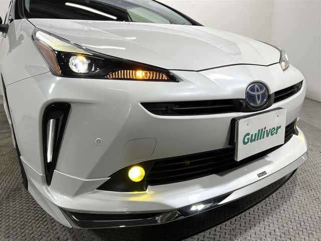 トヨタ プリウス A ツーリングセレ ブラックED 大阪府 2021(令3)年 3.3万km パールⅡ 純正大型ナビ/フルセグTV/CD/DVD/AM/FM/Bluetooth接続/ビルトインETC/レーダークルーズコントロール/衝突軽減/レーンキープ/全方位カメラ/100V1500W電源/パワーシート/シートヒーター/BSM/モデリスタフルエアロ/TRDリアスポイラー/HUD/純正LEDヘッドライト/オートライト/オートハイビーム/プッシュスタート/スマートキー/コーナーセンサー/パーキングアシスト/取説/保証書
