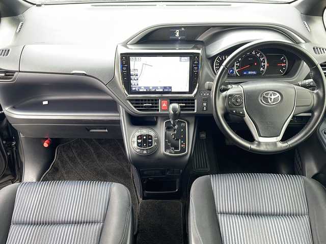 トヨタ ヴォクシー ZS 煌 福岡県 2015(平27)年 8.3万km ブラック ＡＬＰＩＮＥ１０型メモリナビ／ＥＸ１０００/フルセグＴＶ／Bluetooth/CD/DVD/バックカメラ/前後ドライブレコーダー/両側パワースライドドア/ビルトインＥＴＣ/純正１６インチアルミホイール/ＬＥＤヘッドライト/ステアリングスイッチ/プッシュスタート/スマートキー/スペアキー