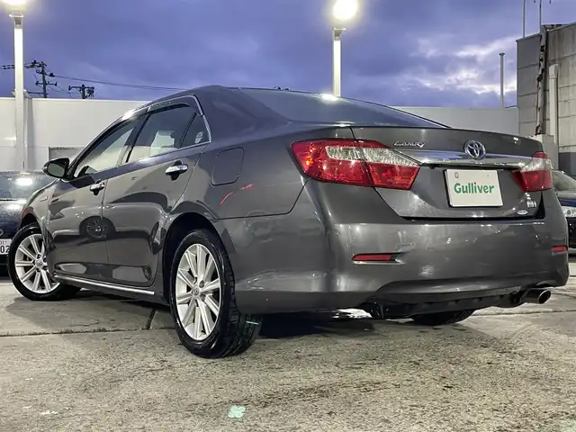 トヨタ カムリ ハイブリット レザーパッケージ 青森県 2012(平24)年 7.6万km グレーメタリック ワンオーナー/純正ナビゲーション/【CD/DVD/SD/Bluetooth/TV】/バックカメラ/ビルトインETC/寒冷地仕様/クルーズコントロール/運転席電動シート/HIDオートライト/フォグランプ/純正フロアマット/純正ドアバイザー/積込スタッドレスタイヤ社外１７インチ/社外レーダー/社外エンジンスターター/スペアキー1本/保証書/取扱説明書