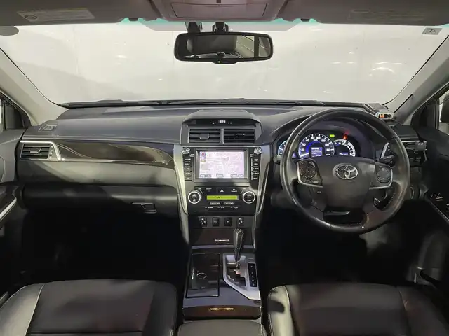 トヨタ カムリ ハイブリット レザーパッケージ 青森県 2012(平24)年 7.6万km グレーメタリック ワンオーナー/純正ナビゲーション/【CD/DVD/SD/Bluetooth/TV】/バックカメラ/ビルトインETC/寒冷地仕様/クルーズコントロール/運転席電動シート/HIDオートライト/フォグランプ/純正フロアマット/純正ドアバイザー/積込スタッドレスタイヤ社外１７インチ/社外レーダー/社外エンジンスターター/スペアキー1本/保証書/取扱説明書