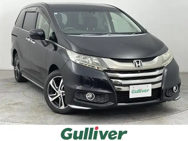 ホンダ オデッセイ アブソルート EX 道央・札幌 2015(平27)年 5.9万km クリスタルブラックパール ・４WD/・純正ナビ/　CD/DVD/SD/BT/フルセグ/・純正フリップダウンモニター/・全方位カメラ/・ビルトインETC/・全方位ドライブレコーダー/・衝突軽減ブレーキ/・レーダークルーズコントロール/・レーンキープアシスト/・ブラインドスポットモニター/・両側パワースライドドア/・レザーシート/・D席パワーシート/・前席シートヒーター/・プッシュスタート/・スマートキー/・LEDヘッドライト/・フォグライト/・オートライト/・純正フロアマット/・ドアバイザー