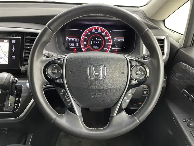 ホンダ オデッセイ アブソルート EX 道央・札幌 2015(平27)年 5.9万km クリスタルブラックパール ・４WD/・純正ナビ/　CD/DVD/SD/BT/フルセグ/・純正フリップダウンモニター/・全方位カメラ/・ビルトインETC/・全方位ドライブレコーダー/・衝突軽減ブレーキ/・レーダークルーズコントロール/・レーンキープアシスト/・ブラインドスポットモニター/・両側パワースライドドア/・レザーシート/・D席パワーシート/・前席シートヒーター/・プッシュスタート/・スマートキー/・LEDヘッドライト/・フォグライト/・オートライト/・純正フロアマット/・ドアバイザー