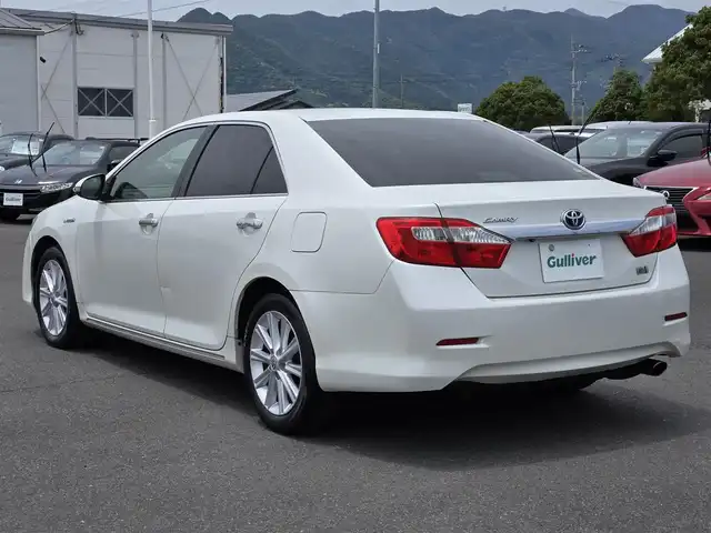 トヨタ カムリ ハイブリット レザーパッケージ 鹿児島県 2013(平25)年 11.5万km ホワイトパールクリスタルシャイン クルーズコントロール　/ビルトインＥＴＣ　/バックカメラ　/Ｄ＋Ｎ席パワーシート　/Ｄ＋Ｎ席シートヒーター　/純正ＨＤＤナビ　/ブラインドスポットモニター　/レザーシート　/本革巻きステアリング　/Bluetoothオーディオ/カーテンエアバッグ/プッシュスタート/スマートキー