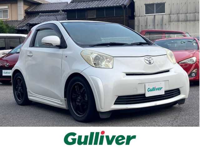 トヨタ ｉＱ GRMN 愛知県 2010(平22)年 13.7万km ホワイトパールクリスタルシャイン １００台限定車/６Ｆ/社外SDナビ（CN-RE04D）/　CD/DVD/BT/SD/AM/FM/iPod/フルセグTV/純正RAYS16インチAW/純正チューニングサス/ETC/ウインカーミラー/純正フロアマット/ドアバイザー/HIDヘッドライト/電動格納ミラー/ヘッドライトレベライザー
