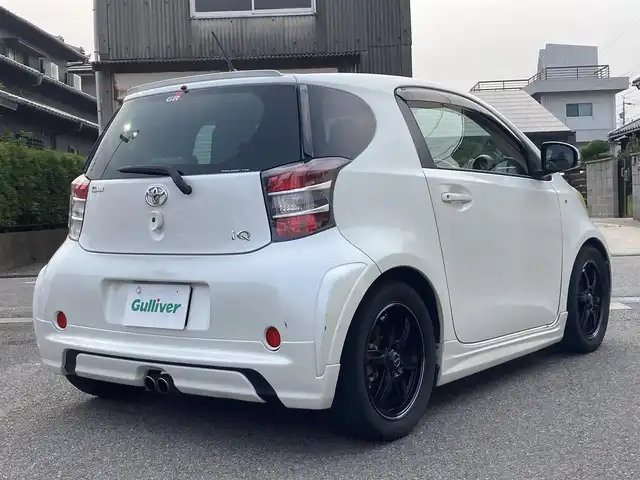 トヨタ ｉＱ GRMN 愛知県 2010(平22)年 13.7万km ホワイトパールクリスタルシャイン １００台限定車/６Ｆ/社外SDナビ（CN-RE04D）/　CD/DVD/BT/SD/AM/FM/iPod/フルセグTV/純正RAYS16インチAW/純正チューニングサス/ETC/ウインカーミラー/純正フロアマット/ドアバイザー/HIDヘッドライト/電動格納ミラー/ヘッドライトレベライザー