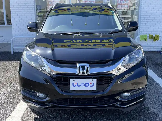 ホンダ ヴェゼル ハイブリッド Z 徳島県 2014(平26)年 12.5万km クリスタルブラックパール (株)IDOMが運営する【じしゃロン徳島店】の自社ローン専用車両になりますこちらは現金またはオートローンご利用時の価格です。/自社ローンご希望の方は別途その旨お申付け下さい”	/メーカー純正ナビゲーション　/（フルセグ/CD/DVD/BT)/バックモニター　/ハーフレザーシート　/ＬＥＤヘッドライト　/フォグランプ　/コーナーセンサー/クルーズコントロール/トラクションコントロール/ステアリングリモコン/ビルトインＥＴＣ　/ドライブレコーダー　/パドルシフト　/ECO＆スポーツモード切替/電動格納ミラー/オールオートパワーウィンドウ/室内LEDランプ/電気式パーキングブレーキ　/オートホールド　/純正フロアマット/サイドバイザー/Wエアバック/カーテンエアバック