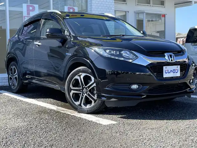 ホンダ ヴェゼル ハイブリッド Z 徳島県 2014(平26)年 12.5万km クリスタルブラックパール (株)IDOMが運営する【じしゃロン徳島店】の自社ローン専用車両になりますこちらは現金またはオートローンご利用時の価格です。/自社ローンご希望の方は別途その旨お申付け下さい”	/メーカー純正ナビゲーション　/（フルセグ/CD/DVD/BT)/バックモニター　/ハーフレザーシート　/ＬＥＤヘッドライト　/フォグランプ　/コーナーセンサー/クルーズコントロール/トラクションコントロール/ステアリングリモコン/ビルトインＥＴＣ　/ドライブレコーダー　/パドルシフト　/ECO＆スポーツモード切替/電動格納ミラー/オールオートパワーウィンドウ/室内LEDランプ/電気式パーキングブレーキ　/オートホールド　/純正フロアマット/サイドバイザー/Wエアバック/カーテンエアバック