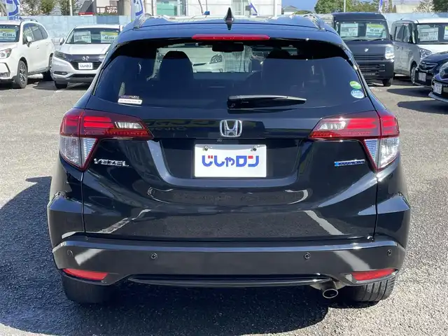 ホンダ ヴェゼル ハイブリッド Z 徳島県 2014(平26)年 12.5万km クリスタルブラックパール (株)IDOMが運営する【じしゃロン徳島店】の自社ローン専用車両になりますこちらは現金またはオートローンご利用時の価格です。/自社ローンご希望の方は別途その旨お申付け下さい”	/メーカー純正ナビゲーション　/（フルセグ/CD/DVD/BT)/バックモニター　/ハーフレザーシート　/ＬＥＤヘッドライト　/フォグランプ　/コーナーセンサー/クルーズコントロール/トラクションコントロール/ステアリングリモコン/ビルトインＥＴＣ　/ドライブレコーダー　/パドルシフト　/ECO＆スポーツモード切替/電動格納ミラー/オールオートパワーウィンドウ/室内LEDランプ/電気式パーキングブレーキ　/オートホールド　/純正フロアマット/サイドバイザー/Wエアバック/カーテンエアバック