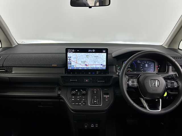 ホンダ ステップワゴン eHEV エアー EX 埼玉県 2025(令7)年 0.3万km メテオロイドグレーメタリック ホンダセンシング　/両側電動スライドドア　/純正ナビ/（TV/AM/FM/BT/CD/DVD)/全方位カメラ/フリップダウンモニター　/ブラインドスポットモニター　/パワーテールゲート　/２列目オットマン　/パドルシフト　/コーナーセンサー　/ビルトインETC/ドアバイザー/D＋N席シートヒーター/革巻きハンドル/純正フロアマット/プッシュスタート/スマートキー