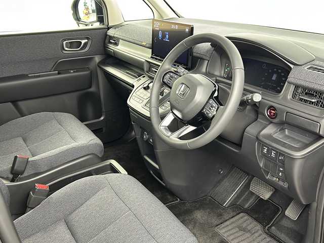 ホンダ ステップワゴン eHEV エアー EX 埼玉県 2025(令7)年 0.3万km メテオロイドグレーメタリック ホンダセンシング　/両側電動スライドドア　/純正ナビ/（TV/AM/FM/BT/CD/DVD)/全方位カメラ/フリップダウンモニター　/ブラインドスポットモニター　/パワーテールゲート　/２列目オットマン　/パドルシフト　/コーナーセンサー　/ビルトインETC/ドアバイザー/D＋N席シートヒーター/革巻きハンドル/純正フロアマット/プッシュスタート/スマートキー