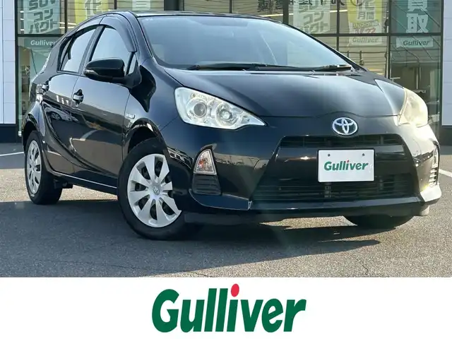 トヨタ アクア G 岡山県 2013(平25)年 15.5万km ブラック 登録時走行距離154273km/純正ナビ/地デジTV(AM/FM/CD/DVD/Bluetooth)/バックカメラ/ETC/ヘッドライトレベライザー/アイドリングストップ/電動格納ミラー/シートヒーター/オートライト/純正フロアマット/プッシュスタート/スマートキー/レザーシートカバー/保証書/取扱説明書