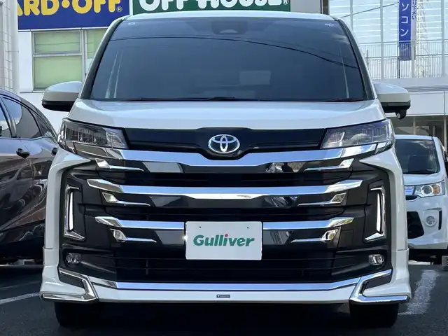 トヨタ ノア ハイブリッド S－Z 長崎県 2023(令5)年 3.2万km ホワイトパールクリスタルシャイン ワンオーナー/モデリスタフルエアロ/純正ナビ(フルセグTV/BT/CD/FM/AM)/バックカメラ/ETC/両側パワースライドドア/シートヒーター/ハーフレザーシート/ステアリングスイッチ/LEDヘッドライト/クルーズコントロール