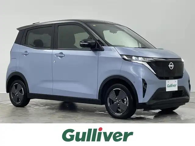 日産 サクラ G 埼玉県 2022(令4)年 1.6万km ライトブルーⅡ プロパイロット パーキングアシスト 純正9型ナビ アラウンドビューモニター ステアリングヒーター シートヒーター コーナーセンサー エマージェンシーブレーキ ステアリングスイッチ LEDヘッドライト