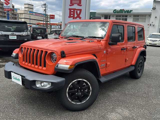 クライスラー・ジープ ジープ ラングラー アンリミテッド サハラ 富山県 2020(令2)年 4.1万km オレンジ ワンオーナー/スマートキー（２本）/レザーシート/4WD/メーカーオプションナビ/衝突安全ブレーキ/Bluetooth/ETC2.0/バックカメラ/レーダークルーズコントロール/シートヒーター（D/N）/ステアリングヒーター/LEDヘッドライト/フォグランプ/純正フロアマット/横滑り防止装置/ドライブレコーダー（前/後）/アイドリングストップ/クリアランスソナー/ヒルディセントコントロール/保証書/取扱説明書/車載タイヤ（255/70R18）