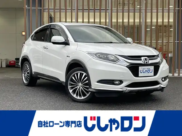 ホンダ ヴェゼル ハイブリッド X 鳥取県 2014(平26)年 10.3万km ホワイトオーキッドパール (株)IDOMが運営する【じしゃロン鳥取店】の自社ローン専用車両になります。こちらは現金またはオートローンご利用時の価格です。自社ローンご希望の方は別途その旨お申付け下さい/４WD/純正ナビ/・フルセグTV/・AM/FM/・CD/DVD/・Bluetooth接続/バックカメラ/クルーズコントロール/純正LEDヘッドライト/プッシュスタート/あんしんパッケージ/純正フロアマット/ETC