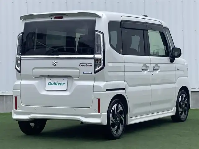 スズキ スペーシア カスタム HYBRID XS 香川県 2024(令6)年 1.2万km ピュアホワイトP 登録時走行距離：11824km/メーカー純正メモリナビ/　CD DVD BT フルセグTV/全方位カメラ/両側パワースライドドア/デュアルセンサーブレーキサポート/レーンキープアシスト/レーダークルーズコントロール/ヘッドアップディスプレイ/クリアランスソナー/LEDヘッドライト/オートライト/フォグランプ/前後ドライブレコーダー/ビルトインETC2.0/ハーフレザーシート/シートヒーター/革巻きステアリング/ステアリングヒーター/電子パーキングブレーキ/後席ロールサンシェード/サーキュレーター/アイドリングストップ/横滑り防止装置/プッシュスタート/スマートキー/スペアキー/新車時保証書/取扱説明書