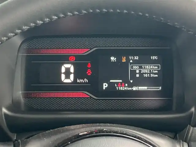 スズキ スペーシア カスタム HYBRID XS 香川県 2024(令6)年 1.2万km ピュアホワイトP 登録時走行距離：11824km/メーカー純正メモリナビ/　CD DVD BT フルセグTV/全方位カメラ/両側パワースライドドア/デュアルセンサーブレーキサポート/レーンキープアシスト/レーダークルーズコントロール/ヘッドアップディスプレイ/クリアランスソナー/LEDヘッドライト/オートライト/フォグランプ/前後ドライブレコーダー/ビルトインETC2.0/ハーフレザーシート/シートヒーター/革巻きステアリング/ステアリングヒーター/電子パーキングブレーキ/後席ロールサンシェード/サーキュレーター/アイドリングストップ/横滑り防止装置/プッシュスタート/スマートキー/スペアキー/新車時保証書/取扱説明書