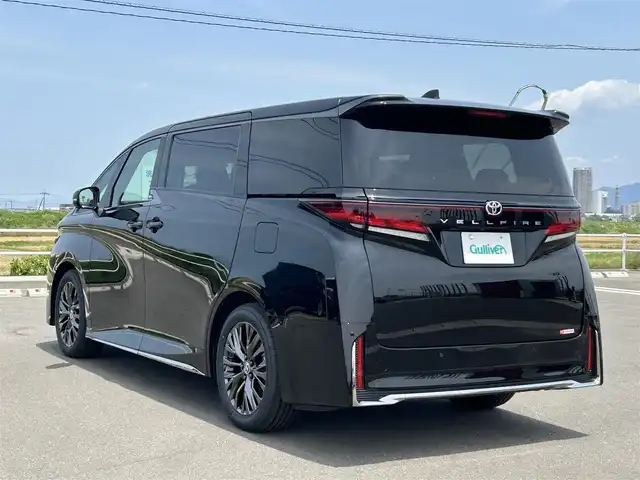 トヨタ ヴェルファイア Z プレミア 佐賀県 2025(令7)年 0.1万km未満 ブラック 登録済未使用車/登録時走行距離9km/左右独立ムーンルーフ/純正14型ディスプレイオーディオ/・HDMI/BT/AM/FM/フルセグTV/・Apple Car Play/Android Auto/パノラミックビューモニター/純正14型リヤシートエンターテインメントシステム/ビルトインETC2.0/純正前後ドライブレコーダー/黒革シート/・DN、セカンド席パワーシート/・DNセカンド席シートヒーター/ベンチレーション/・マイコンプリセットドライビングポジションシステム/革巻きステアリング【木目調】/・ステアリングヒーター/・パドルシフト/両側パワースライドドア/パワーバックドア/デジタルインナーミラー/カラーヘッドアップディスプレイ/後席用パワーサイドサンシェード/電動パーキングブレーキ/アクセサリーコンセント/置くだけ充電/純正19インチアルミホイール/3眼LEDヘッドランプ/アダプティブハイビームシステム/Toyota Safety Sence/・PCS/LTA/FCTA/・レーダークルーズコントロール/・パーキングサポートブレーキ/・ブラインドスポットモニター/・Advanced Park/新車保証書・取扱説明書/スペアキー1本