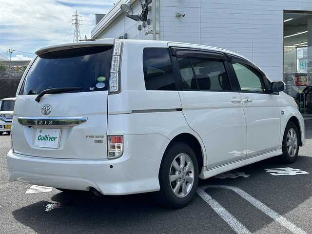 トヨタ アイシス プラタナ 長崎県 2013(平25)年 13.1万km ホワイトパールクリスタルシャイン トヨタ純正SDナビ(FM/AM/CD/DVD/BT/フルセグ)/プッシュスタート/スマートキー/スペアキー(1本)/バックカメラ/純正フロアマット/純正15インチアルミホイール/片側パワスラ/レザー調シートカバー/ABS/横滑り防止装置/盗難防止装置/保証書/記録簿/SRSダブルエアバッグ/3列シート