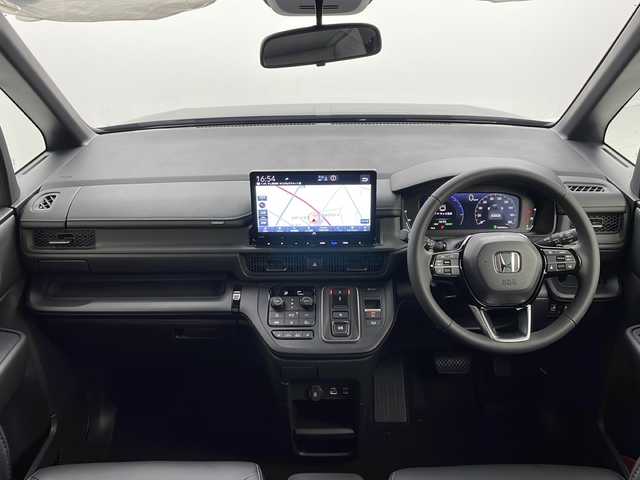 ホンダ ステップワゴン スパーダ eHEV 茨城県 2025(令7)年 0.1千km クリスタルブラックパール 登録済未使用車　純正１１型ナビ　フルセグＴＶ　バックモニター　両側電動スライドドア　追従クルコン　ＬＥＤライト　フォグランプ　シートヒーター　衝突被害軽減ブレーキ　１５．６型後席モニター　スマートキー