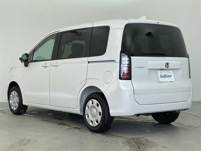 ホンダ フリード AIR 富山県 2025(令7)年 0.1万km未満 プラチナホワイトパール 4WD/純正9型ナビ（AM/FM/BT/USB/フルセグ）/バックカメラ/衝突被害軽減システム/レーダークルーズコントロール/レーンキープアシスト/コーナーセンサー/横滑り防止装置/オートLEDライト/オートマチックハイビーム/両側パワースライドドア/シートヒーター/スマートキー