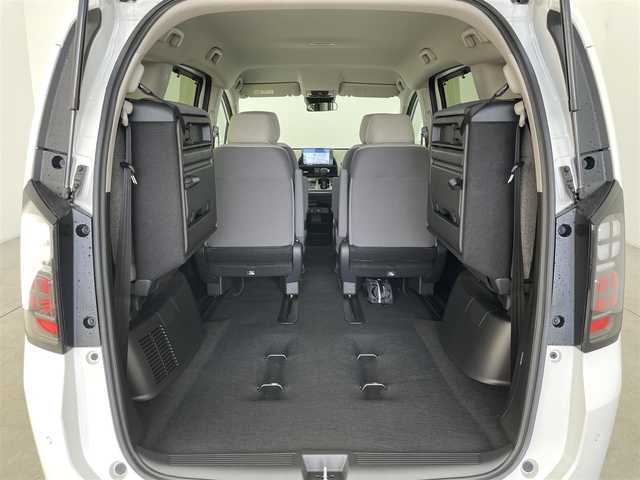 ホンダ フリード AIR 富山県 2025(令7)年 0.1万km未満 プラチナホワイトパール 4WD/純正9型ナビ（AM/FM/BT/USB/フルセグ）/バックカメラ/衝突被害軽減システム/レーダークルーズコントロール/レーンキープアシスト/コーナーセンサー/横滑り防止装置/オートLEDライト/オートマチックハイビーム/両側パワースライドドア/シートヒーター/スマートキー