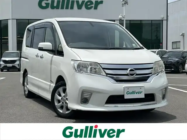 日産 セレナ ハイウェイS G Sハイブリッド 愛媛県 2013(平25)年 4.8万km ブリリアントホワイトパール 禁煙車/登録時走行距離：48060km/ETC/ディーラーＯＰ純正ナビ　/BT/CD/DVD/AM/FM/３列シート/横滑り防止装置/キセノンヘッドライト/バックカメラ/両側パワースライドドア