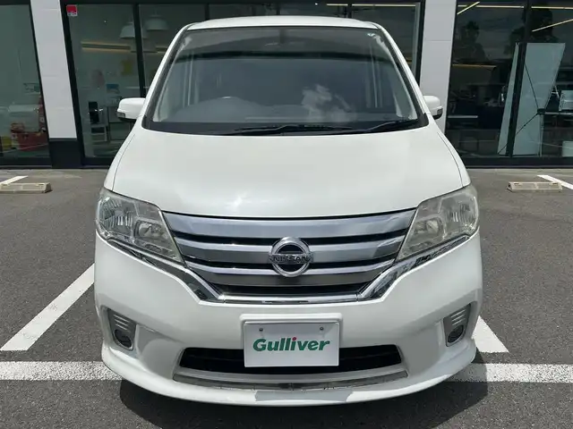 日産 セレナ ハイウェイS G Sハイブリッド 愛媛県 2013(平25)年 4.8万km ブリリアントホワイトパール 禁煙車/登録時走行距離：48060km/ETC/ディーラーＯＰ純正ナビ　/BT/CD/DVD/AM/FM/３列シート/横滑り防止装置/キセノンヘッドライト/バックカメラ/両側パワースライドドア