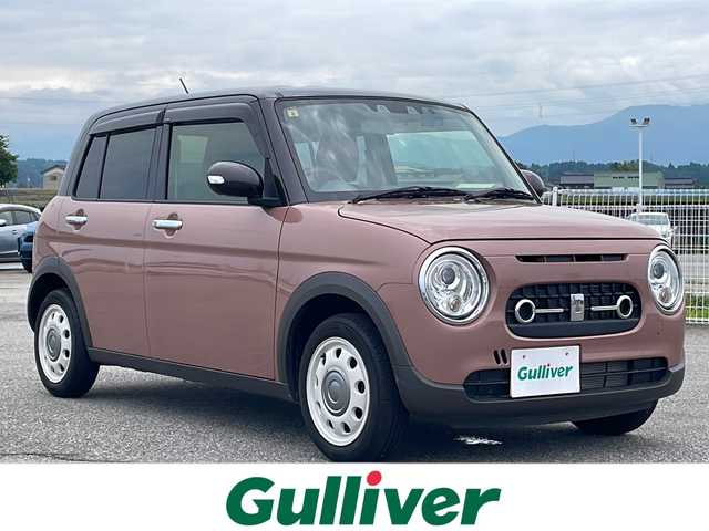 スズキ ラパン X 富山県 2023(令5)年 1.3万km テラコッタピンクメタリック/アーバンブラウン 2トーン 4WD/ワンオーナー/社外SDナビ（CN-HE02WD）/フルセグ/Bluetooth/バックカメラ/衝突被害軽減ブレーキ/レーンキープアシスト/コーナーセンサー/前席シートヒーター/ドライブレコーダー