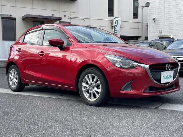 マツダ デミオ XD 岡山県 2015(平27)年 7.5万km ソウルレッドプレミアムメタリック 登録時走行距離74954km/純正SDナビ/(AM/FM/DISC/TV/USB/BT)/衝突被害軽減システム/アイドリングストップ/バックカメラ/ビルトインETC/クルーズコントロール/スマートキー/スペアキー×1/プッシュスタート/LEDヘッドライト/純正15インチアルミホイール/電動格納ミラー/パワーステアリング/パワーウィンドウ