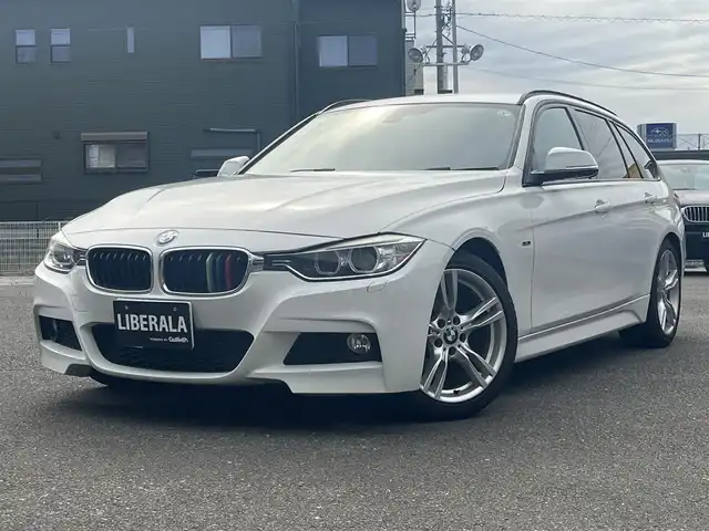ＢＭＷ ３２０ｉ ツーリング Mスポーツ 静岡県 2013(平25)年 12万km アルピンホワイトⅢ ・純正ナビ/・バックカメラ/・ビルドインET/・前後コーナーセンサー/・HIDヘッドライト/・フォグランプ/・オートライト/・パワーシートD/N/・シートメモリD席/・シートヒーターD/N/・純正18インチアルミホイール/・純正フロアマット/・パドルシフト/・アイドリングストップ/・プッシュスタート/・スマートキー/・スペアキー1本/・電動リアゲート